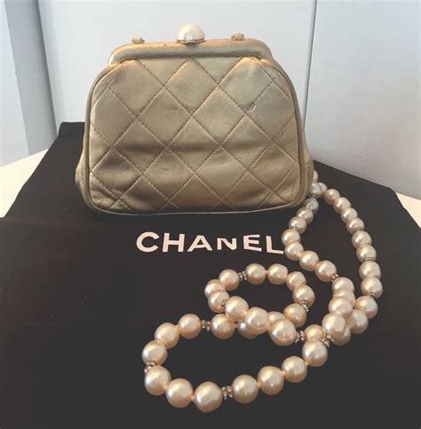 chanel leather bag with gold chain original|chanel bag with pearl chain.